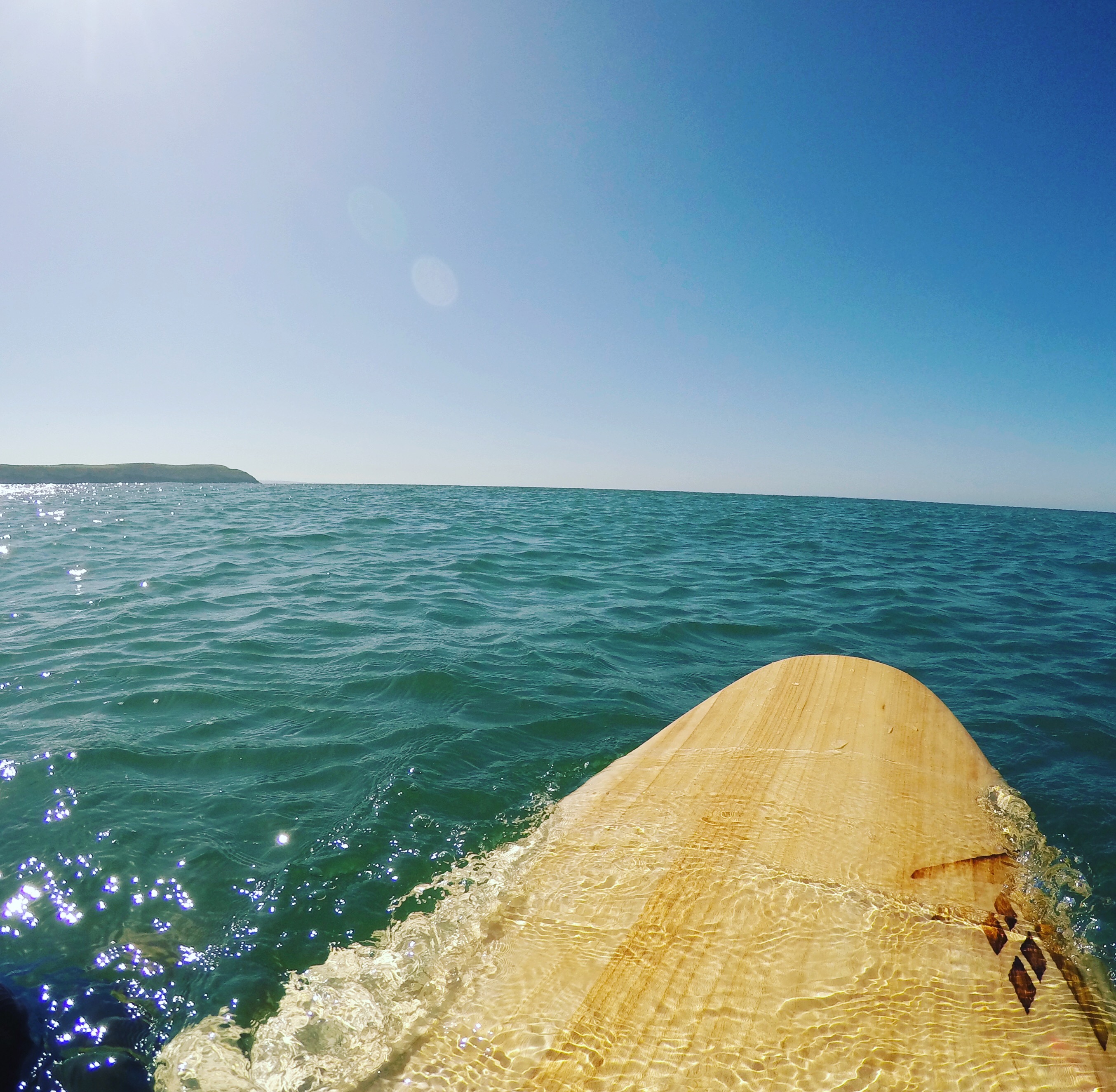 waiting for waves out the back on Woolacombe Beach, surfing with Woolacombe Surf Centre, surf lessons, surf school
