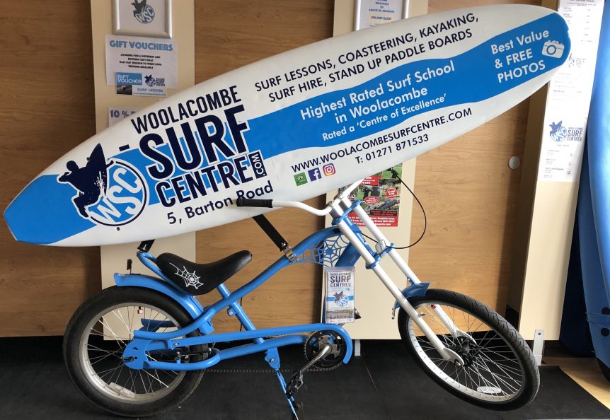 Woolacombe Surf Centre bike, iconic bike, surfboard, surf lessons at Woolacombe