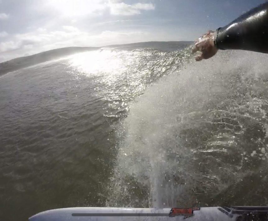 Down the line surf shot with in water camera surf instructor from Woolacombe Surf Centre- Gary King