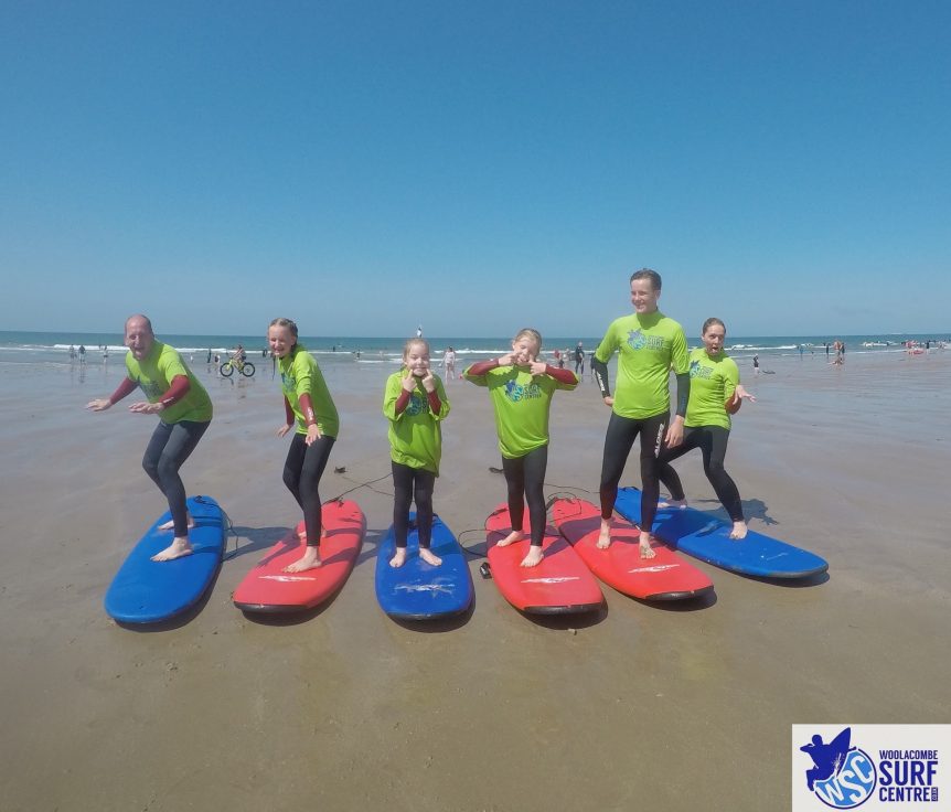 Family fun in the the with Woolacombe Surf Centre, surf school. Sunshine, sea and sand