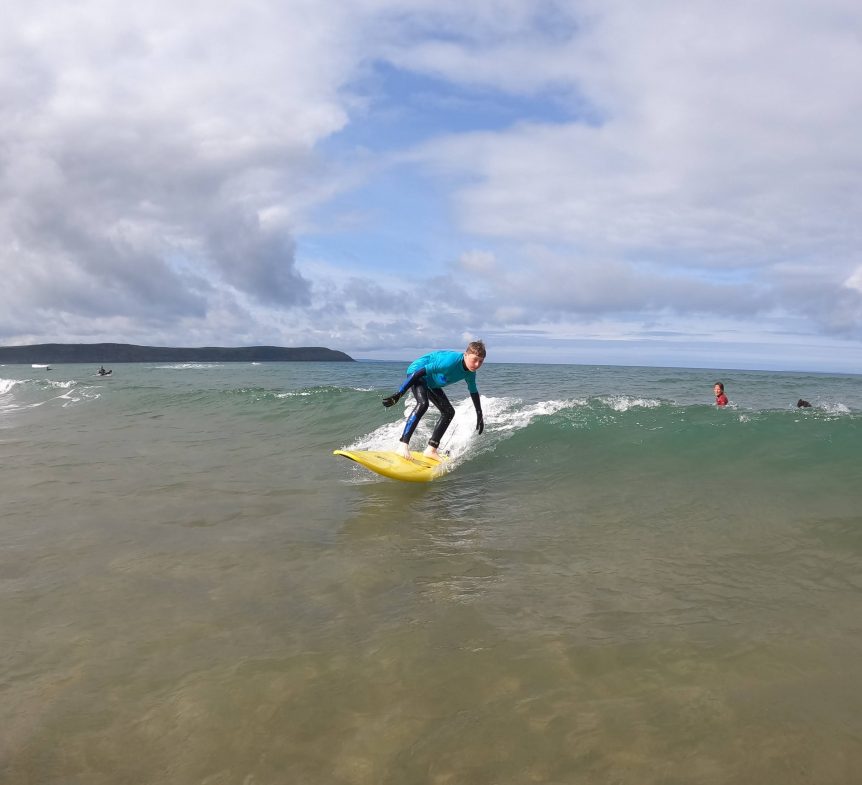 Surfing green waves, unbroken waves for the first time, surf school progression, intermediate, surfing Woolacombe North Devon, surf lessons