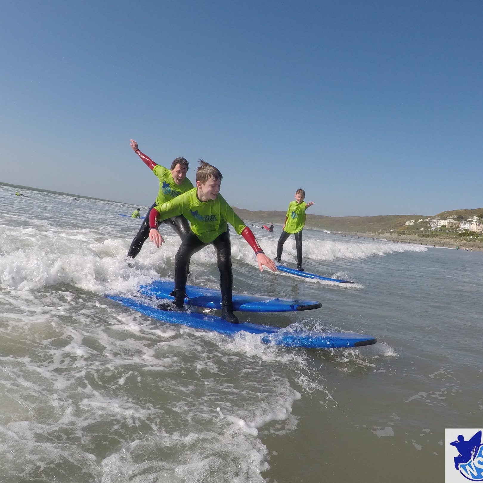 Happy boys learning to surf with Woolacombe Surf Centre
