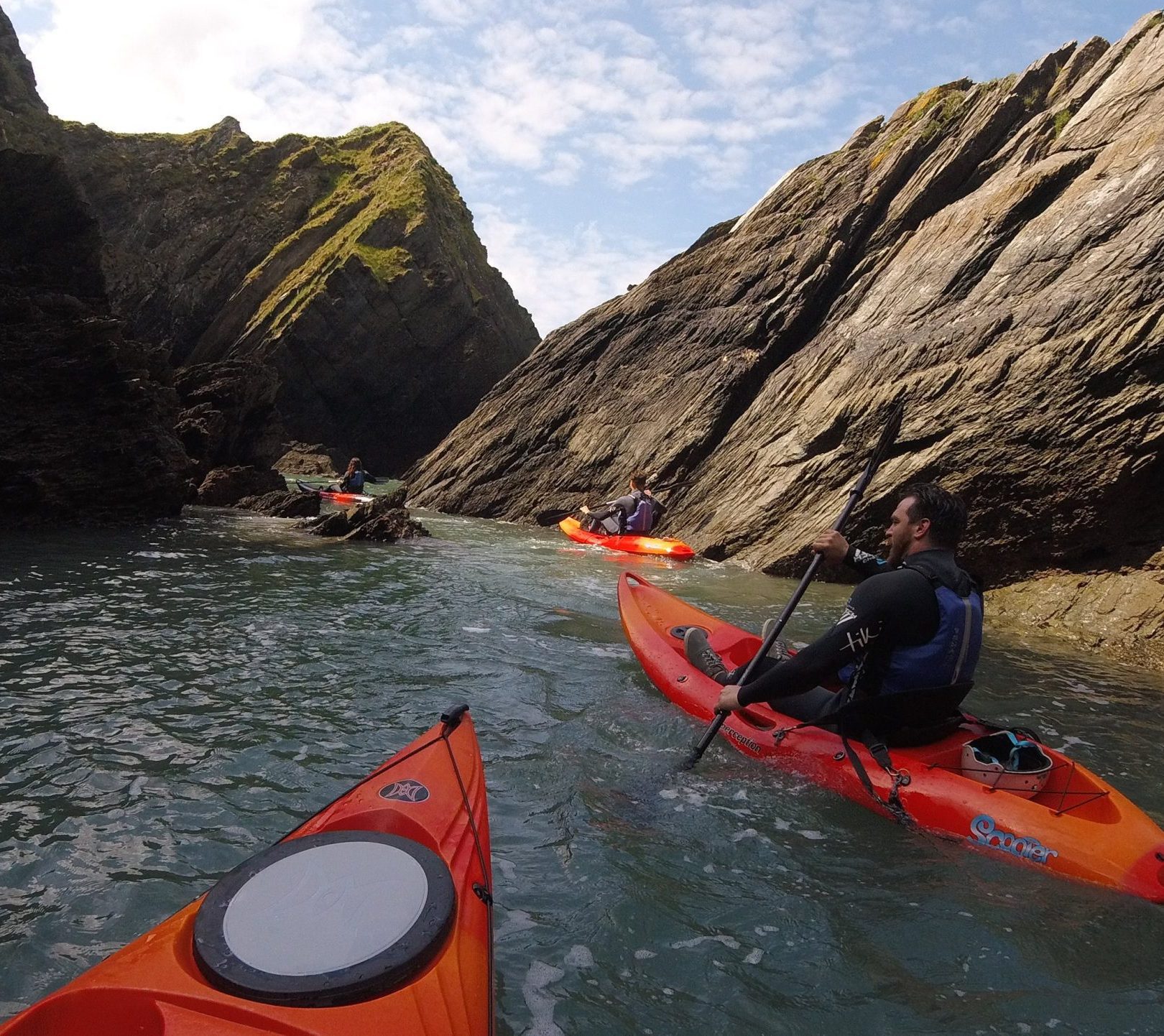 Kayakers with Woolacombe Surf Centre exploring Swallows Hole