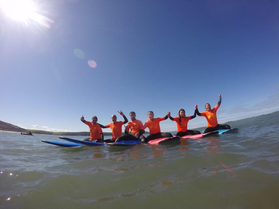 Surfing group with Woolacombe Surf Centre